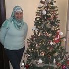 منال النجار, English teacher