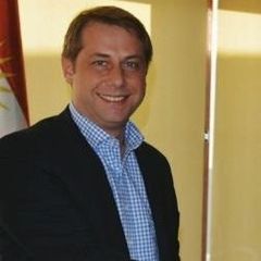 Roland DEBS, Cluster General Manager