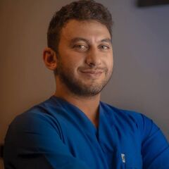 Essam Faisal, Prosthodontist  At Juzoor Dental Care