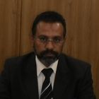 حسن محمد حسن, المدير المالي والإداري