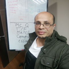 محمد محمود مصطفي احمد العزوني, english instructor