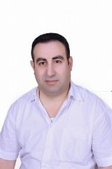 edmun hanna, مدير المصرف العقاري بمدينة حماه