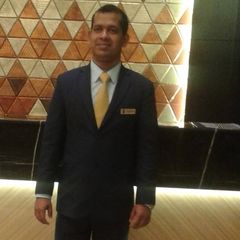 Dinesh Jayasinghe, Waiter, Butler, Guest service executive