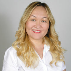 Aisulu Doszhanova, Senior English Teacher