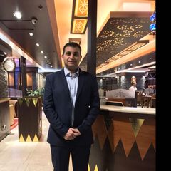 Maged George, restaurant manager