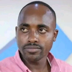 John KAMAU 