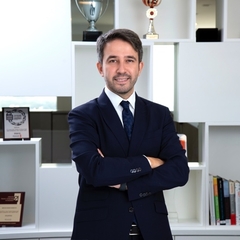 Ali Cem Ozturk , executive director